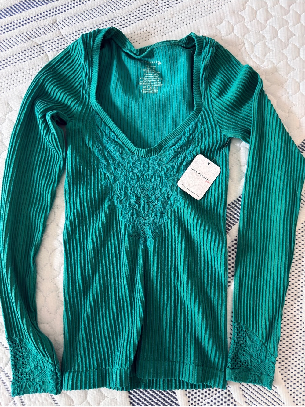 NWT free people Women’s Teal Ribbed V-Neck Long Sleeve Top
xs/s